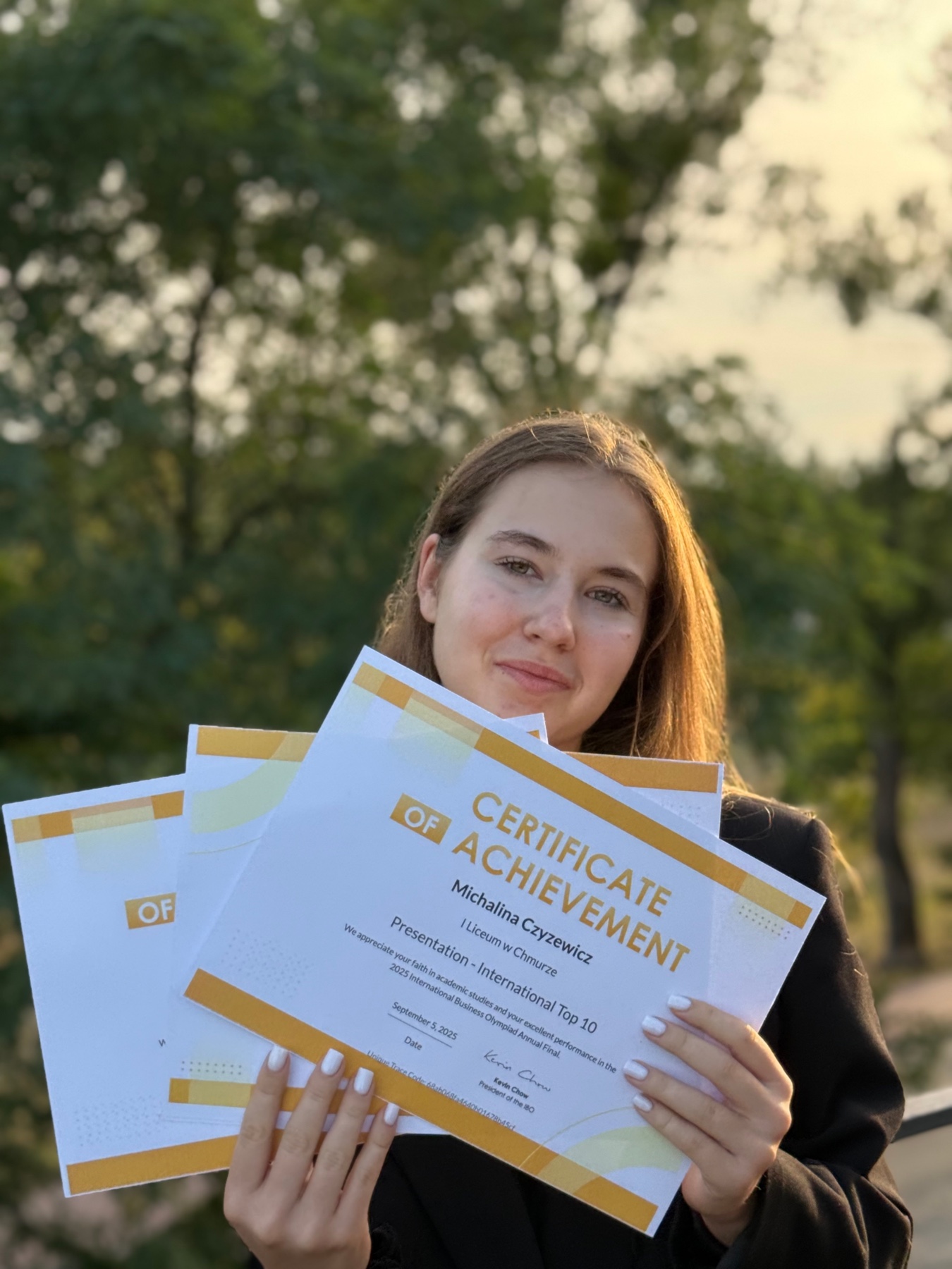 Michalina z certyfikatami International Business Olympiad